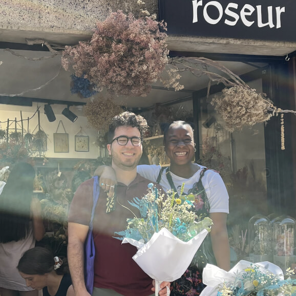 Couple smiling at a floristry class
